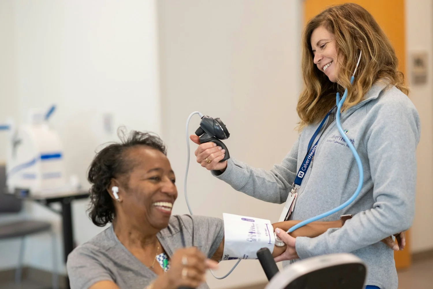 Dedicated to Your Health: A CalvertHealth team member checks a patient’s blood pressure with care and precision.