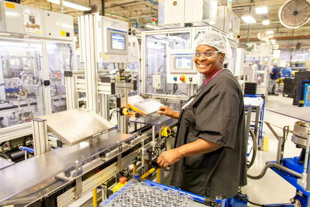 A team member hard at work with a positive attitude. 