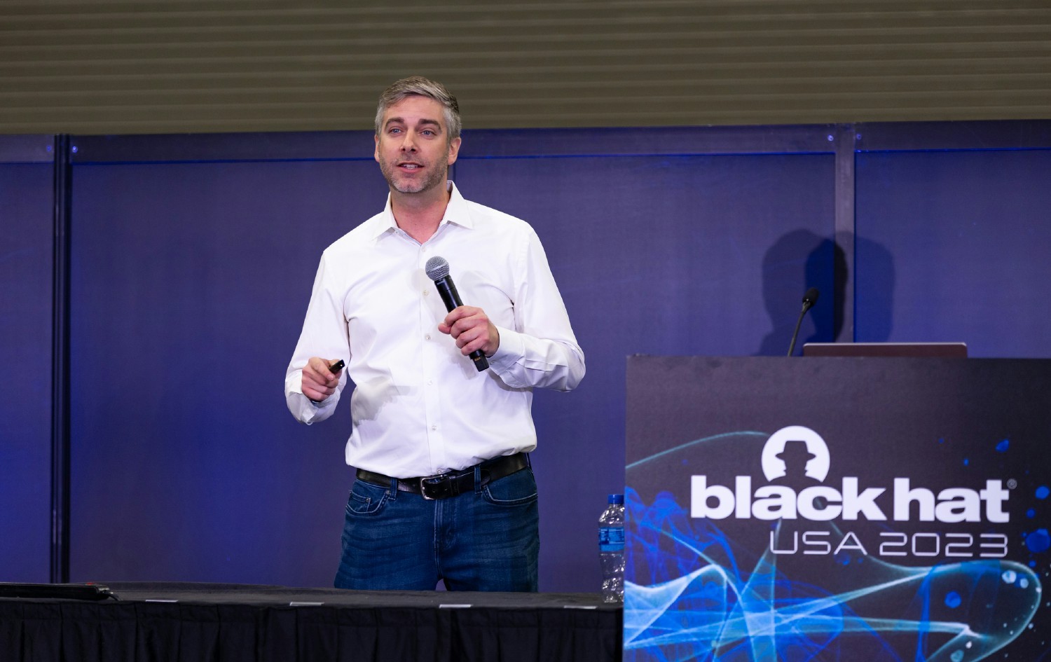 AppOmni CEO Brendan O’Connor on stage at Black Hat USA to discuss identity risk within the SaaS ecosystem. 