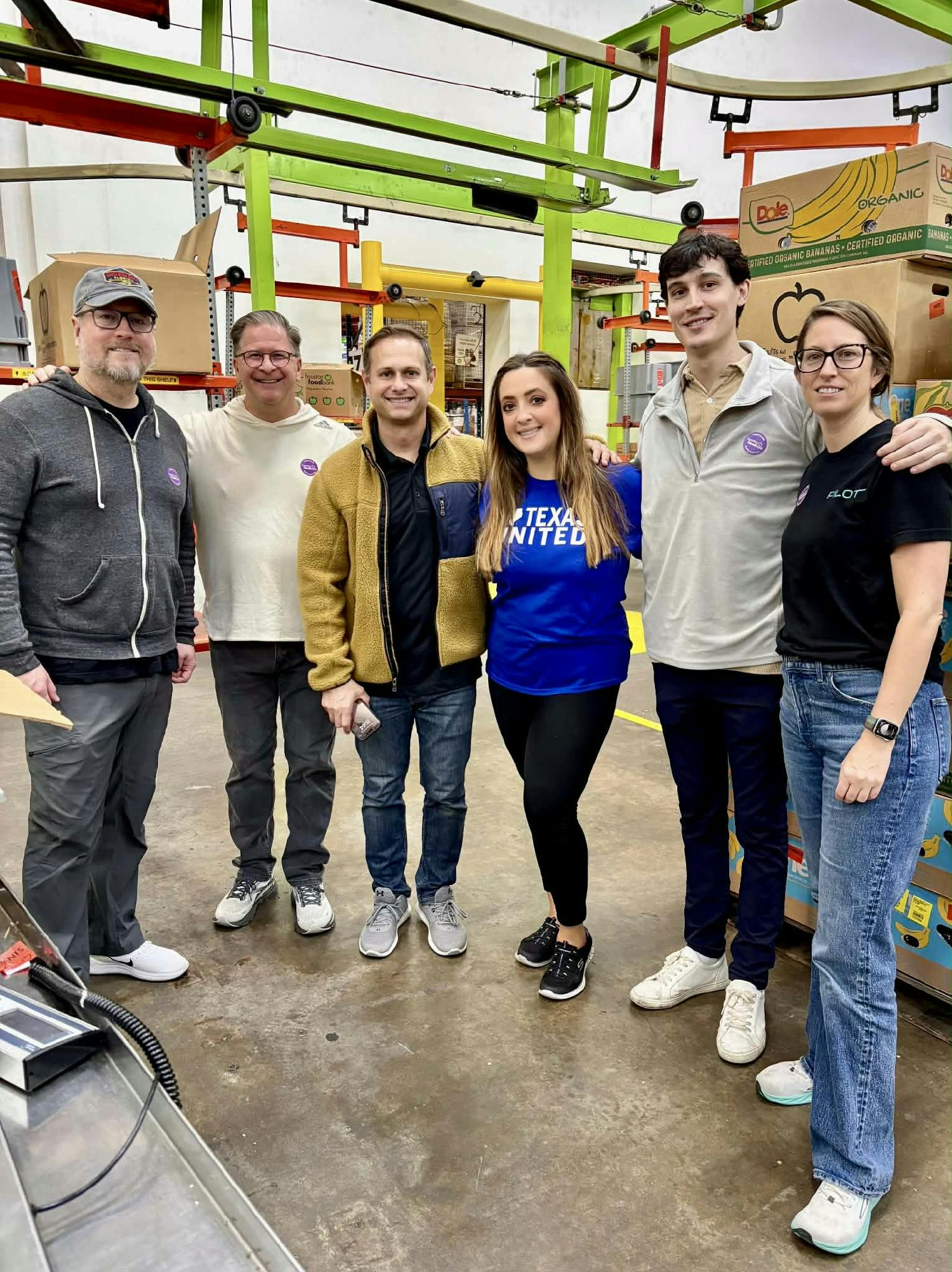 Our Houston team volunteered at the Houston Food Bank, helping pack 18,000+ meals for families in need.