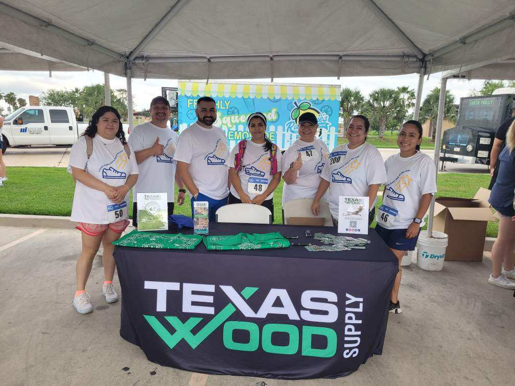 Team members join the Walk for Wishes 5K to support children in need.