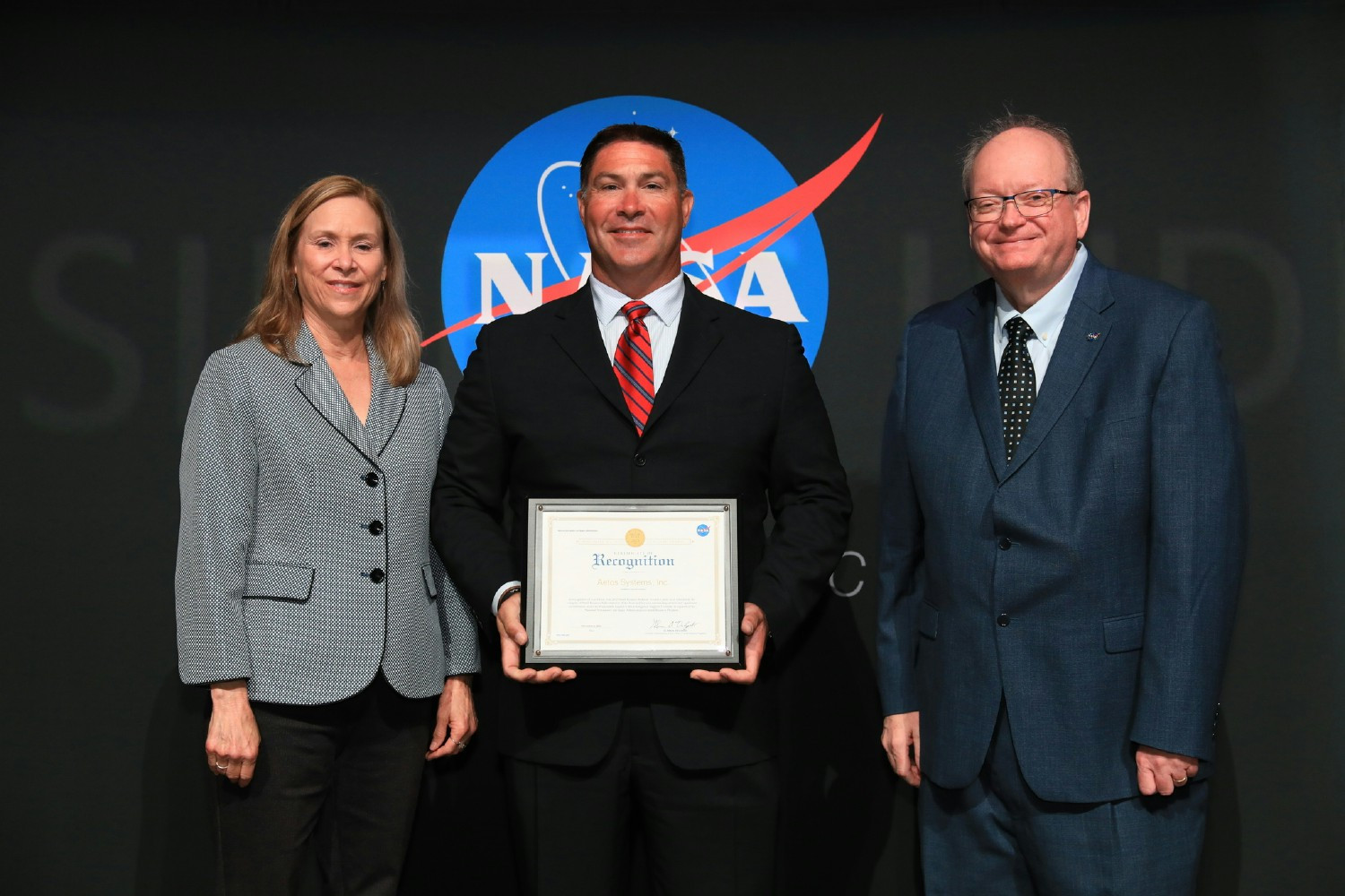 Receiving the Kennedy Space Center Small Business Subcontractor of the Year Award.