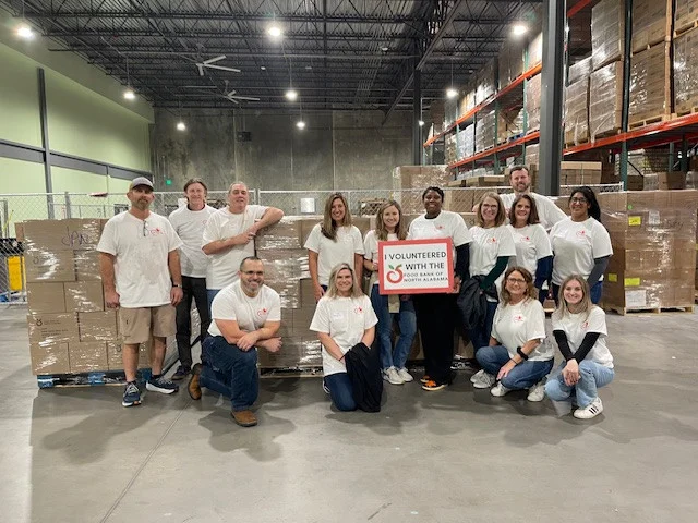 Aetos Huntsville team enjoyed giving back while volunteering at the North Alabama Food Bank.  