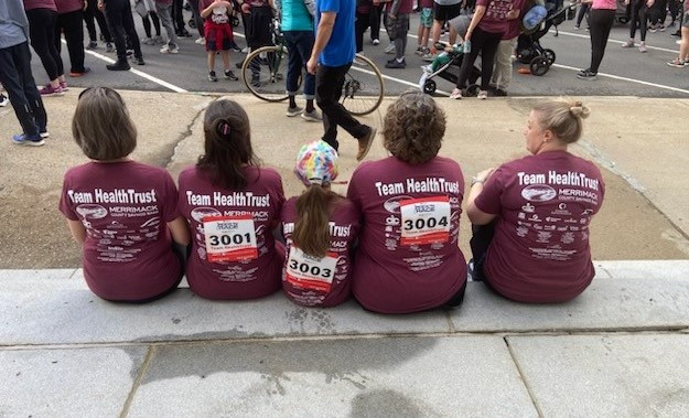 Team HealthTrust participating in a 5k walk/run to benefit a local center center, including family & friends! 