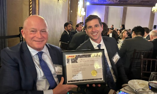 Senior Operating Partner, Tim Fallon receiving Deal of The Year award on behalf of Arbor Investments