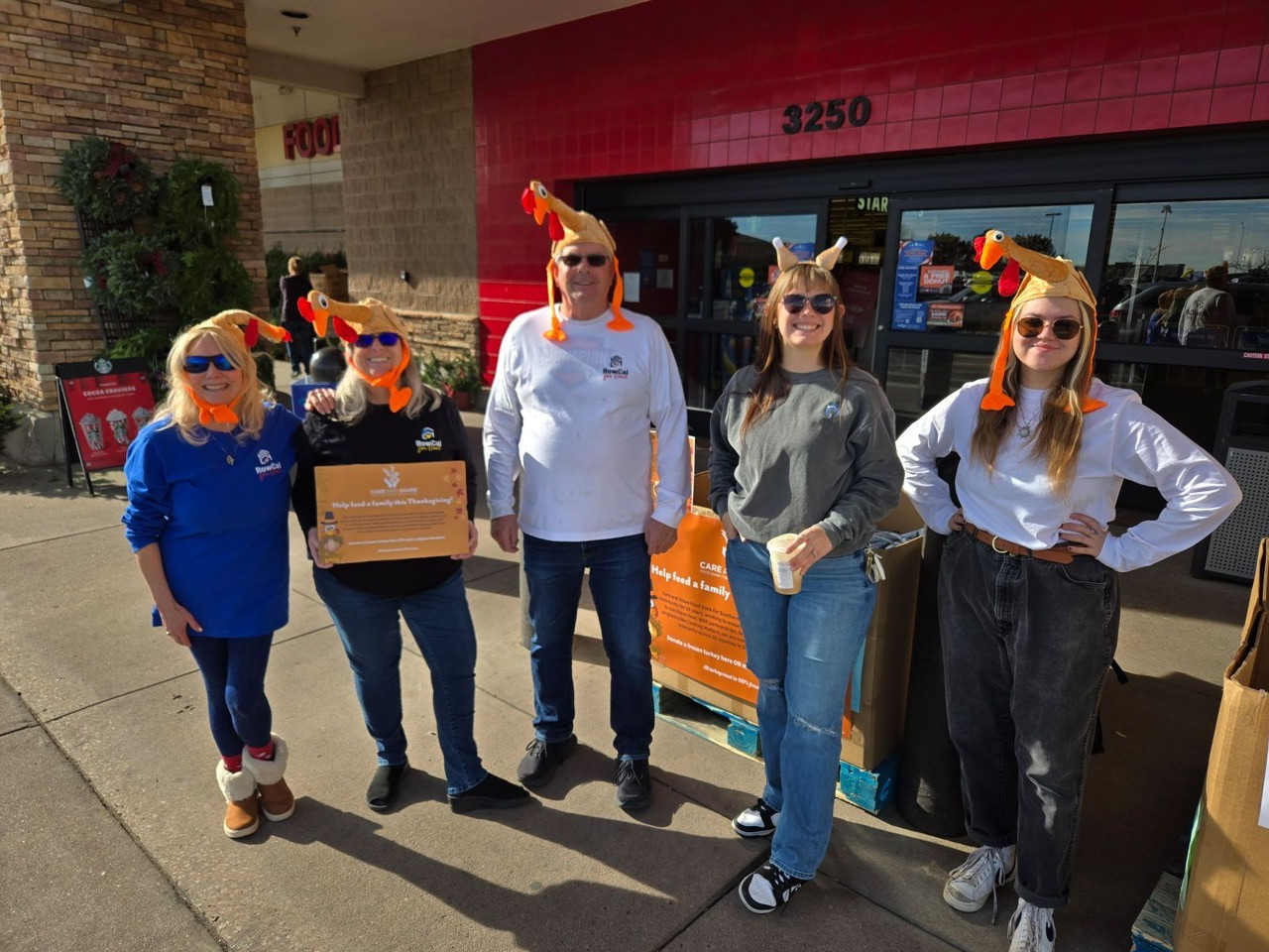RowCal for Good Colorado Springs volunteering at a Thanksgiving Turkey drive with Care & Share