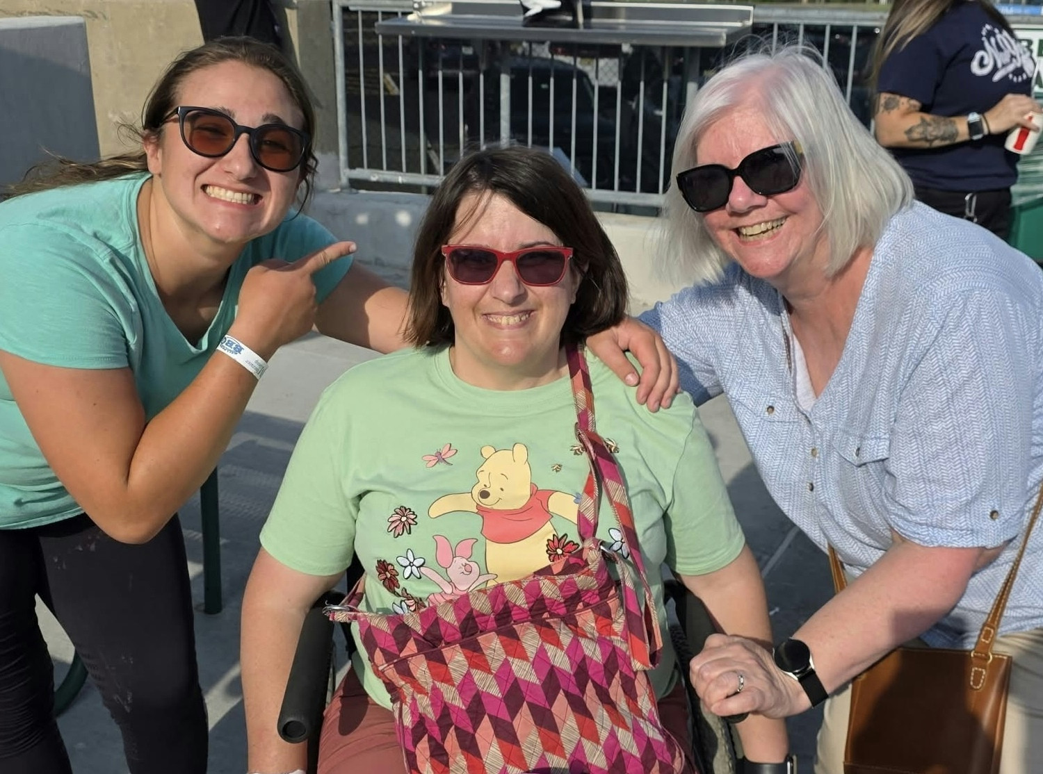 Support Coordination Supervisor, Kate, with clients at an event we held for families during a minor league baseball game