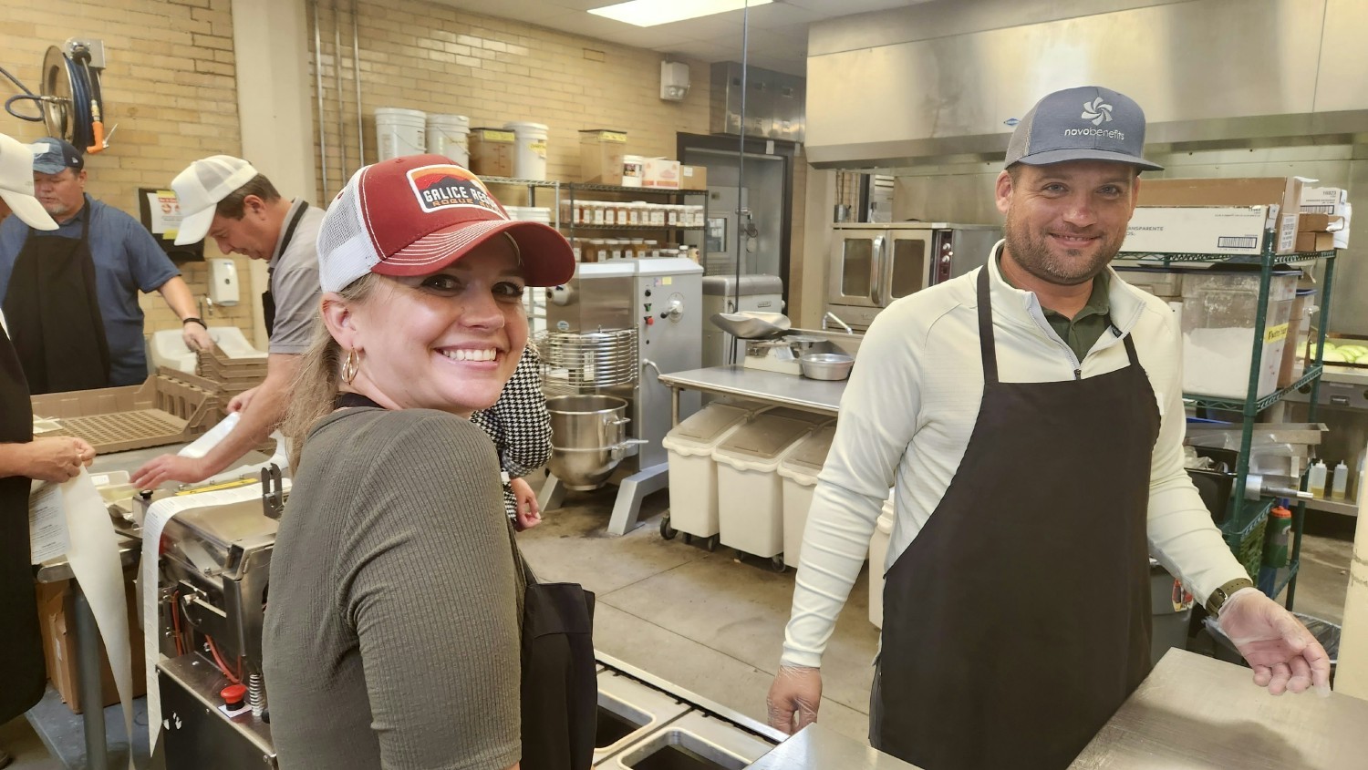 Our team loves to support the local community.  Here, they are volunteering at Project Angel Heart packaging meals.