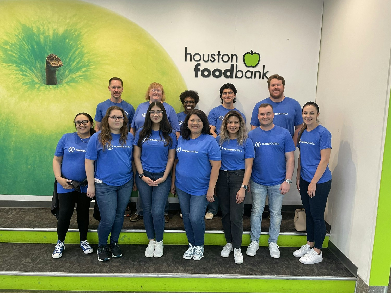 Sooner team volunteers at the Houston Food Bank, giving back and bonding outside the office.