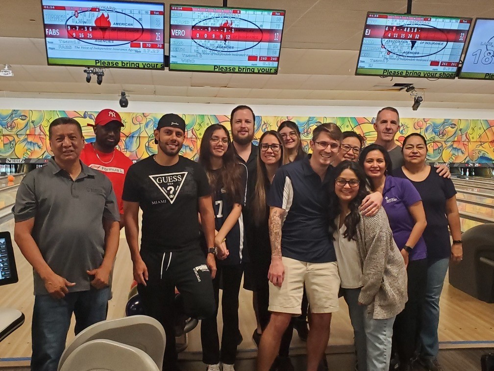 Team members participating in Bowling to Strike out Hunger benefitting LifeNet4Families.
