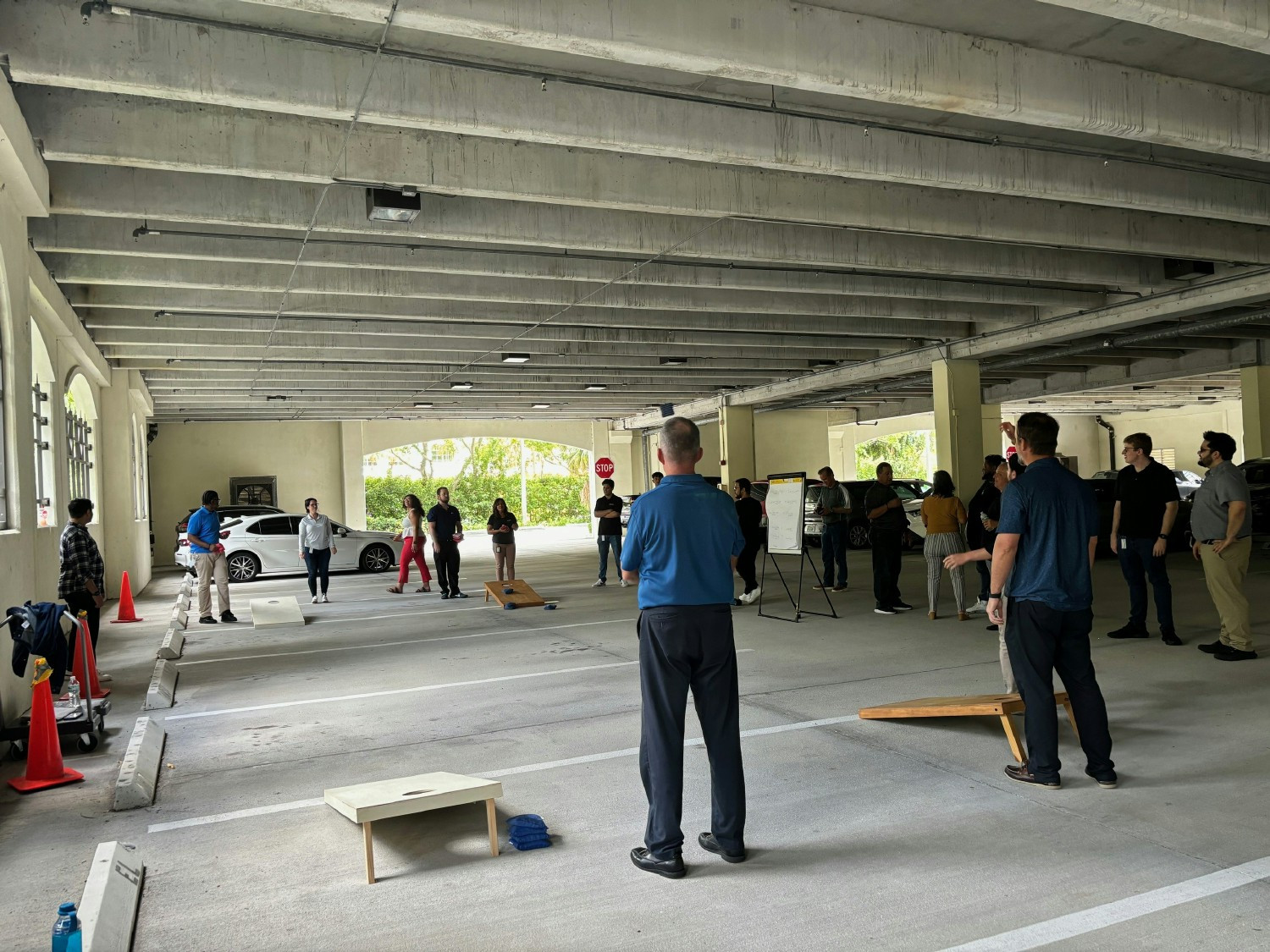 Cornhole Tournament in our parking garage benefitting Broward Partnership for the Homeless. 