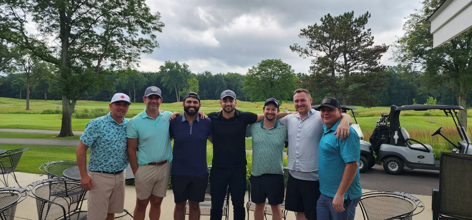 We're a close-knit group in and out of the OR, enjoying leisure activities like golf with resident physicians. 