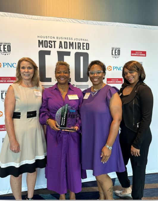 PMB accepting Most Admired CEO Award