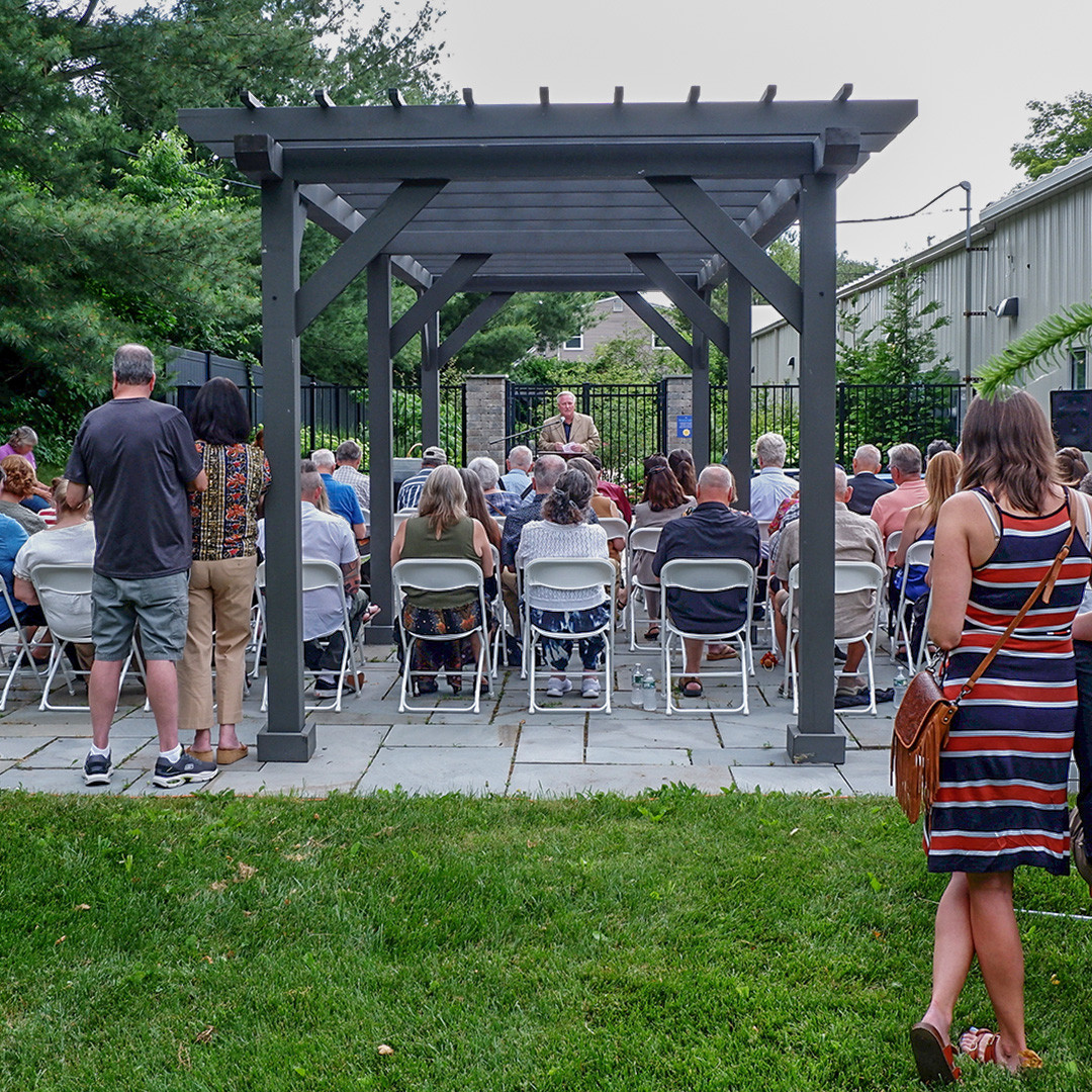 Chaplain Kyle Austin performing a reading at our Fall Memorial Brick Dedication Ceremony. 