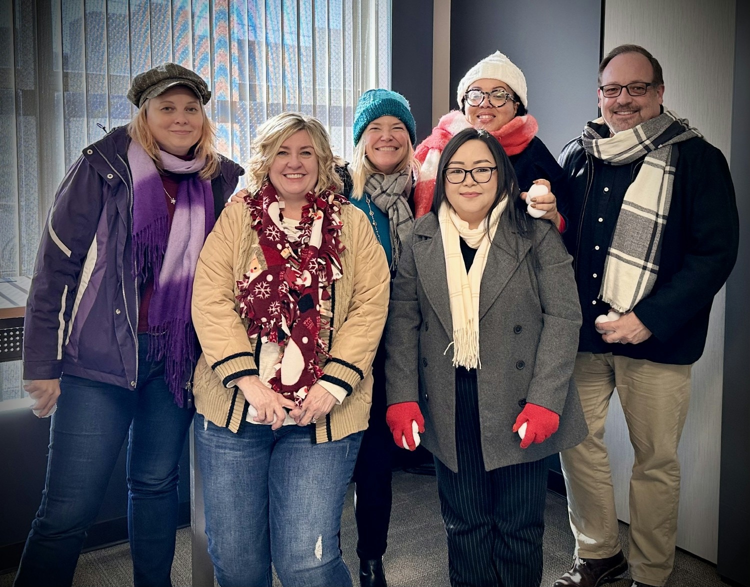 The Human Resources crew during an in-person team meeting.