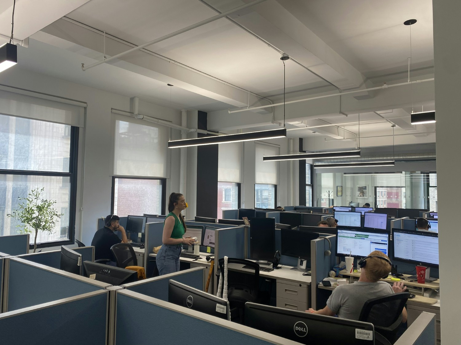 Another day on the Salesfloor growing our client's financial futures like some reps care for and grow our office plants!