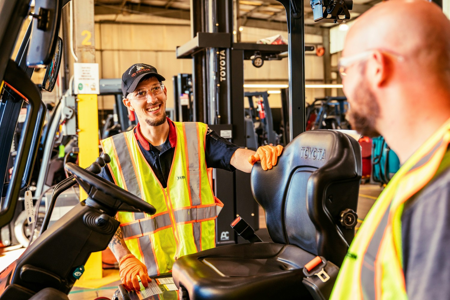 Kenco's Toyota forklift mechanics work together to keep equipment—and teams—running strong.