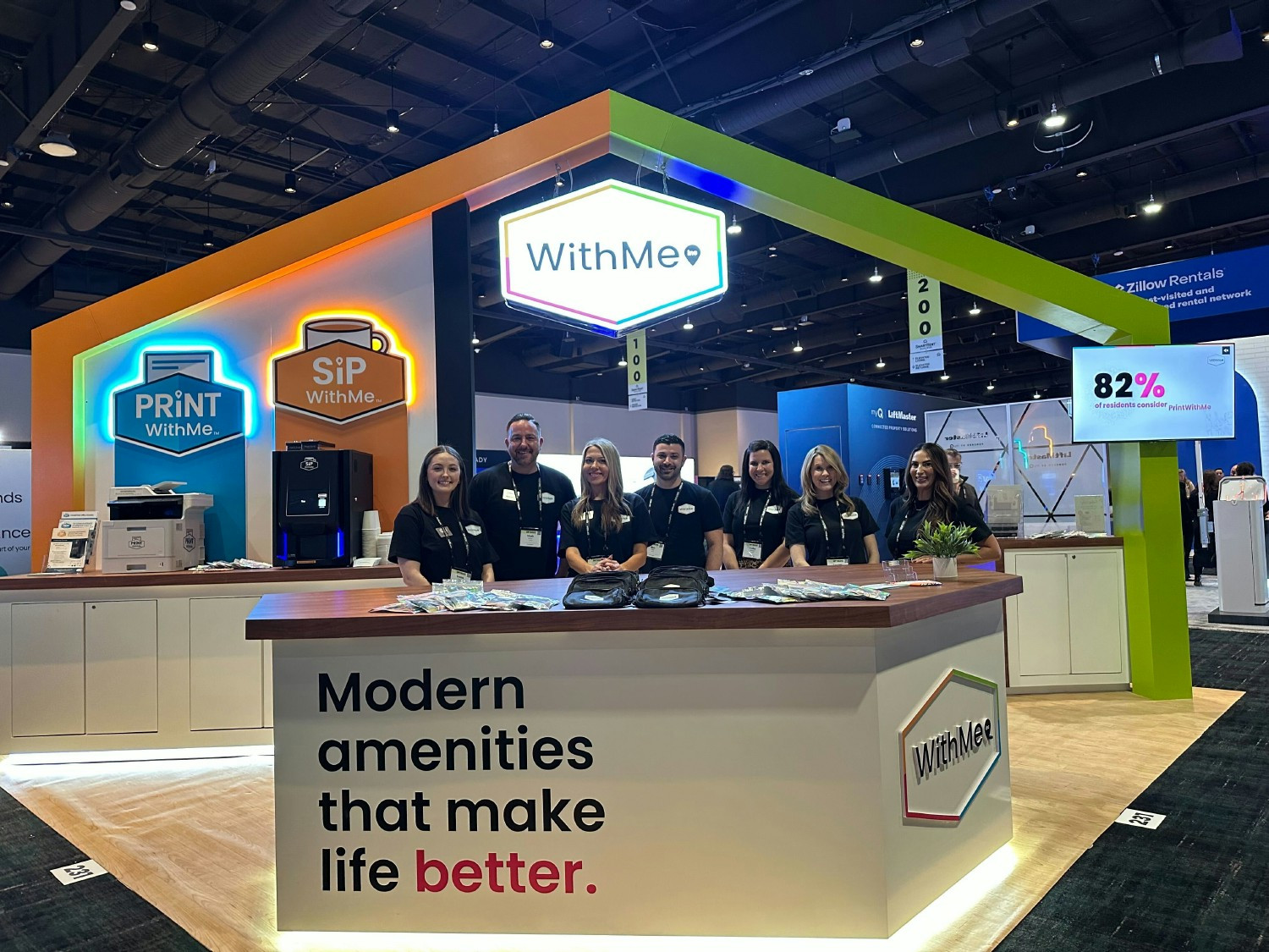 Members of the WithMe team at OPTECH 2025.