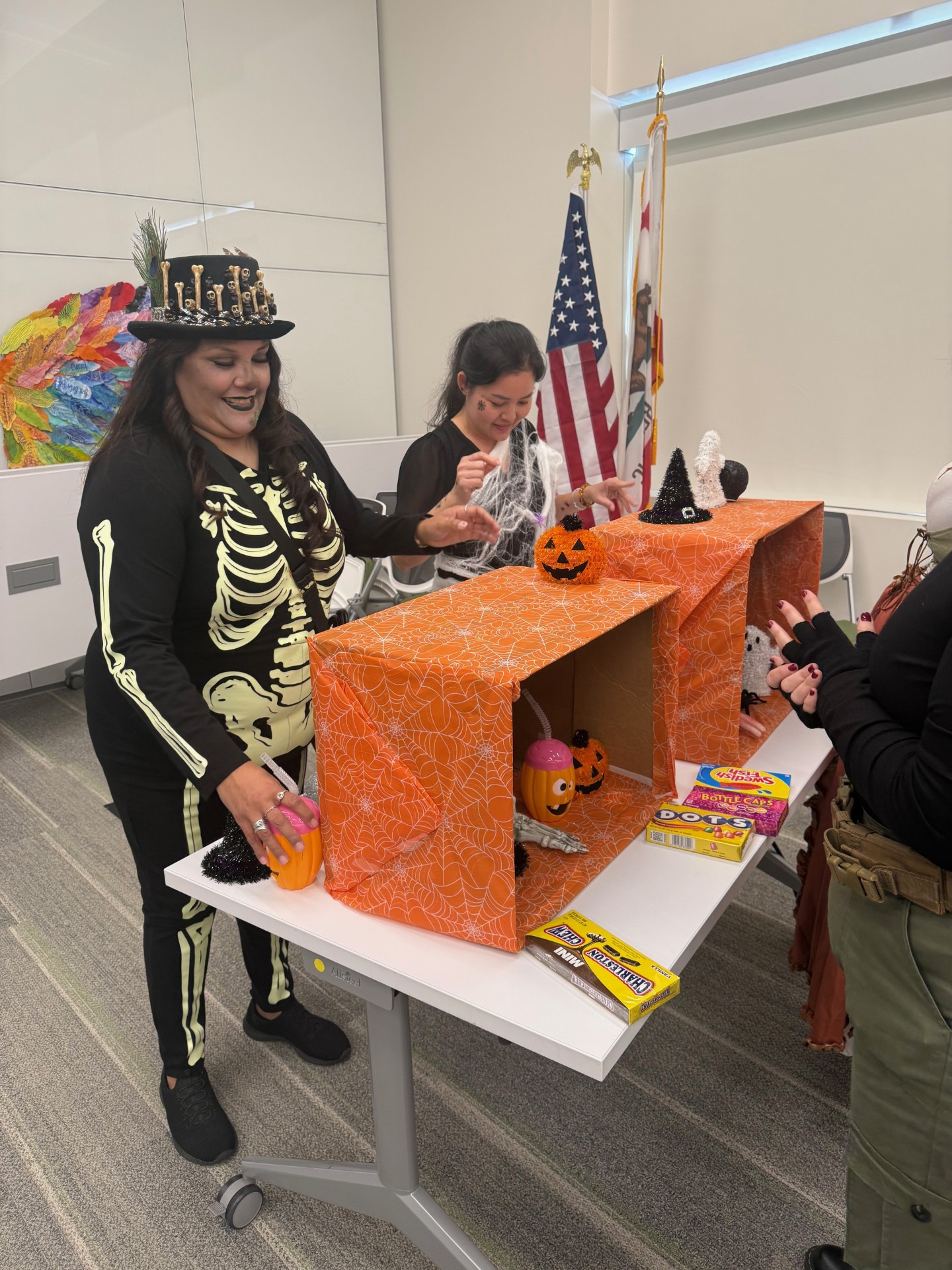Employees playing games at the Halloween Employee Appreciation Party