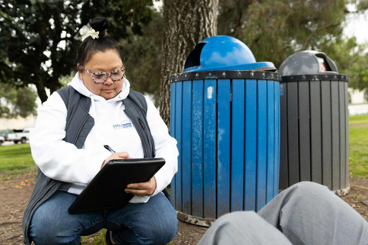 One of our Outreach workers engaging in outreach work with an individual in the community