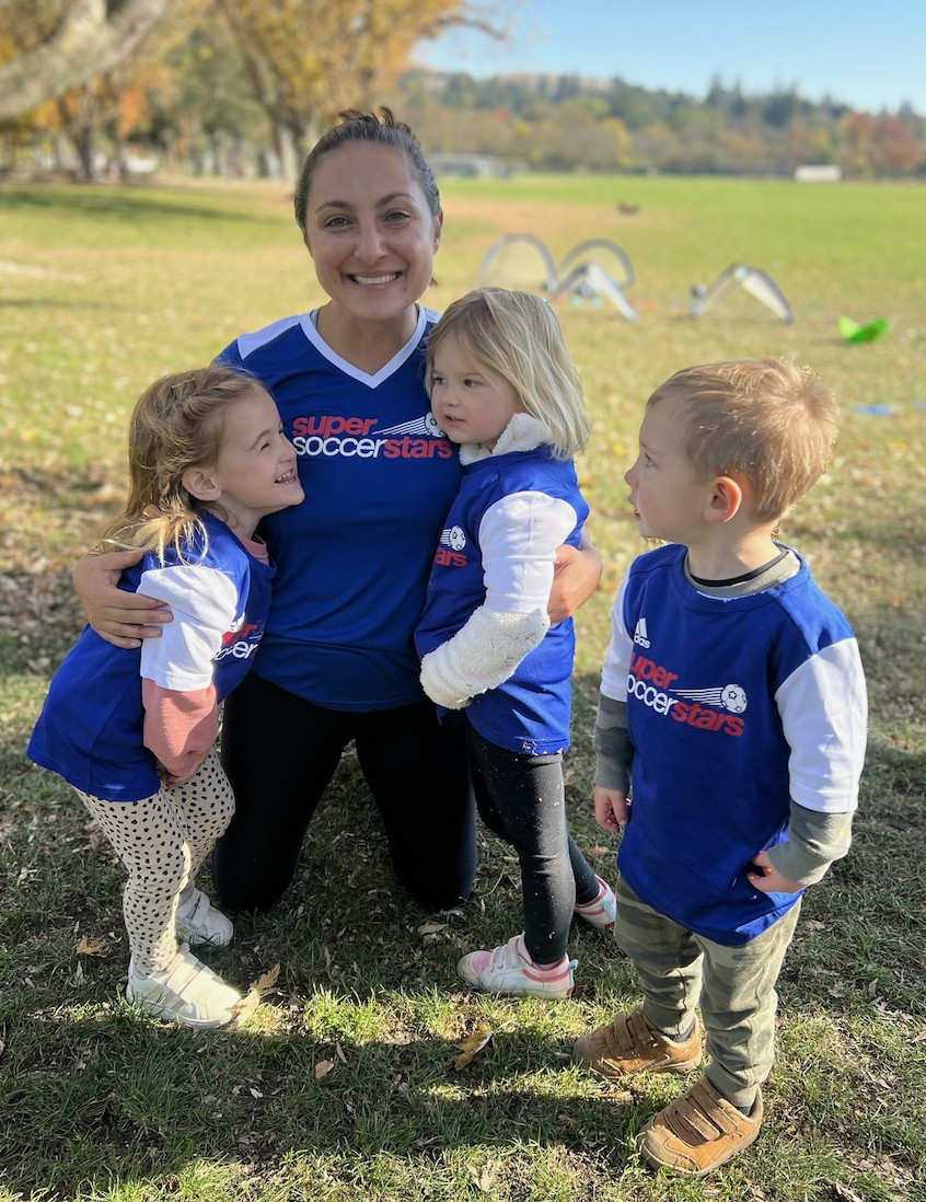 Coach K soaking in the Super Soccer Stars hugs at the last Fall class at Osage Station Park in Danville, CA.