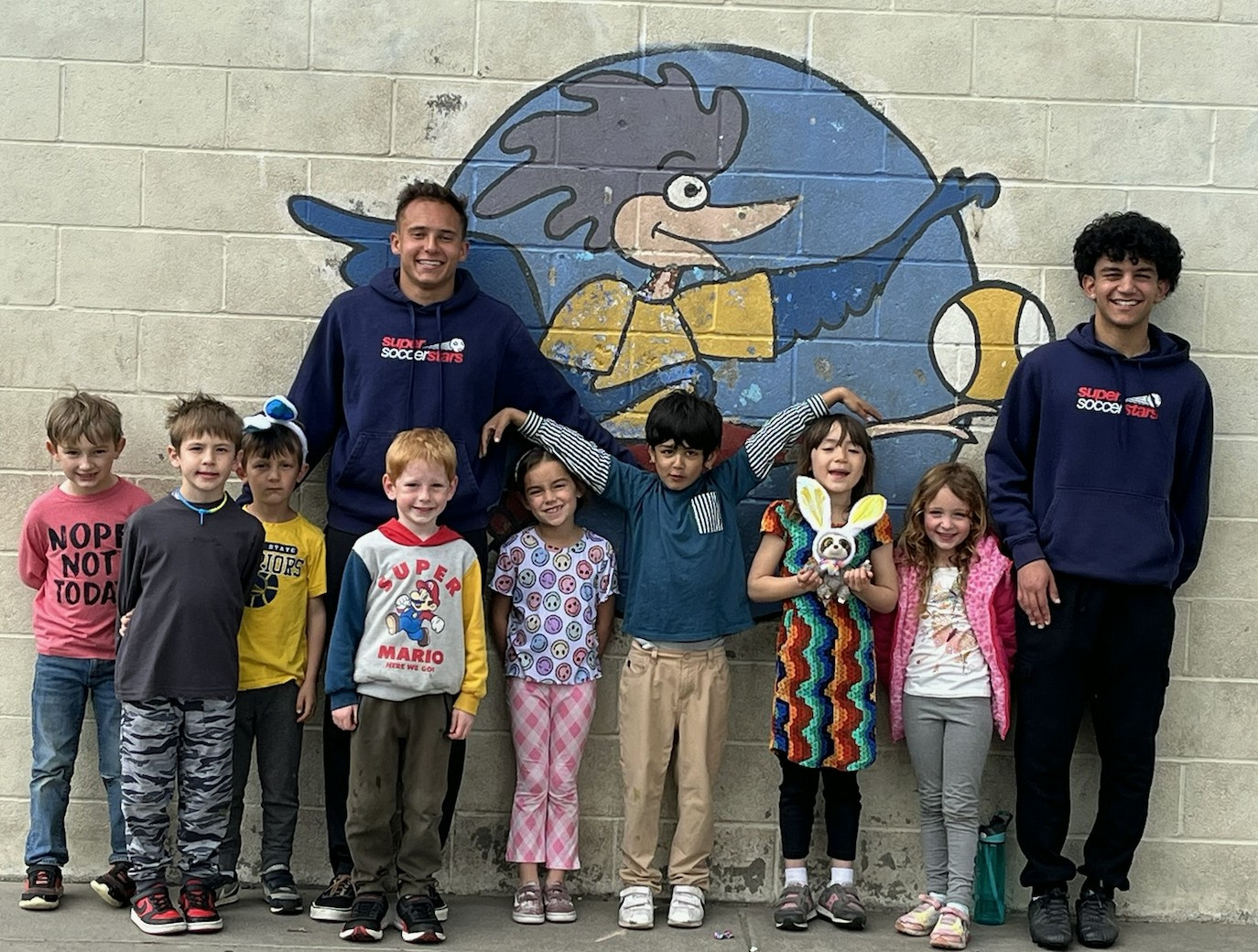 Coaches Zane and Mateen striking a pose with their Soccer Stars at Strandwood Elementary School in Pleasant Hill, CA.