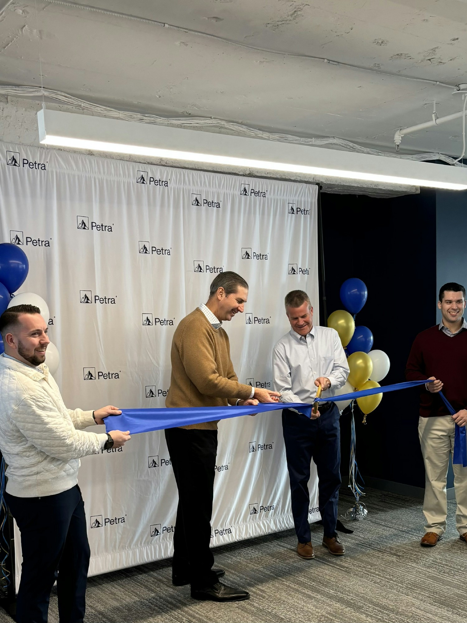 The Boston office had a ribbon cutting ceremony to unveil their new space in February 2025!
