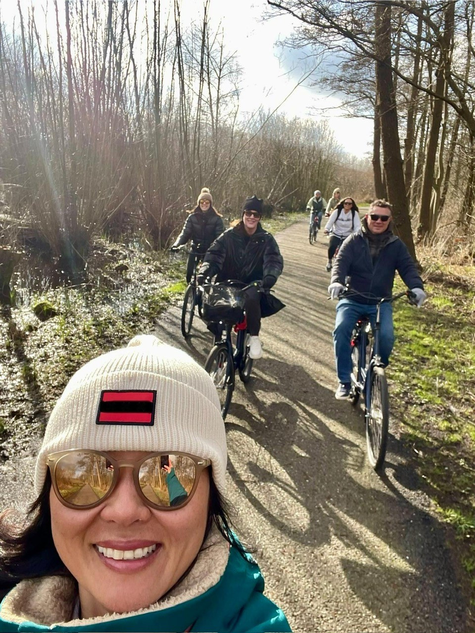 Having a pleasant bike ride together as friends.