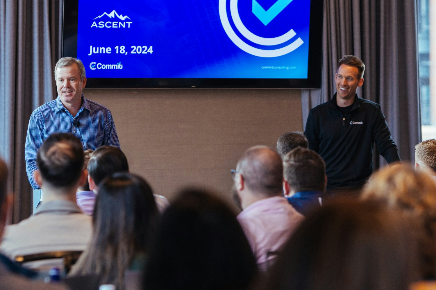 Commit Founders Will Manuel (left) and Matt Cahal (right) kick off a company All Hands event in Denver.