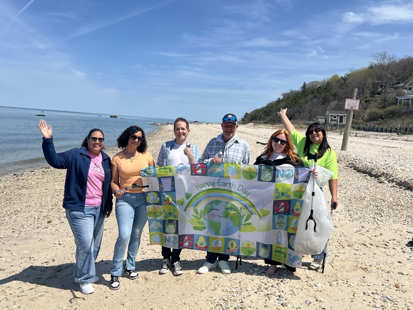 Team members volunteering in honor of Earth Day, giving back to our local community. 