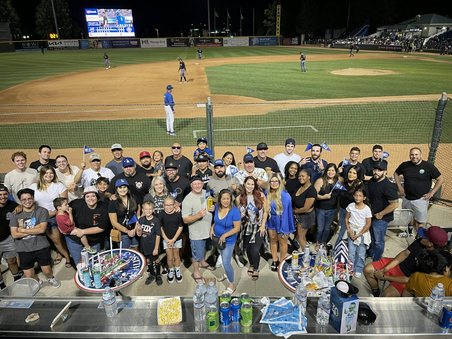 WLG employees at a local minor league baseball game. WLG's FUN Committee hosts quarterly employee events outside of work