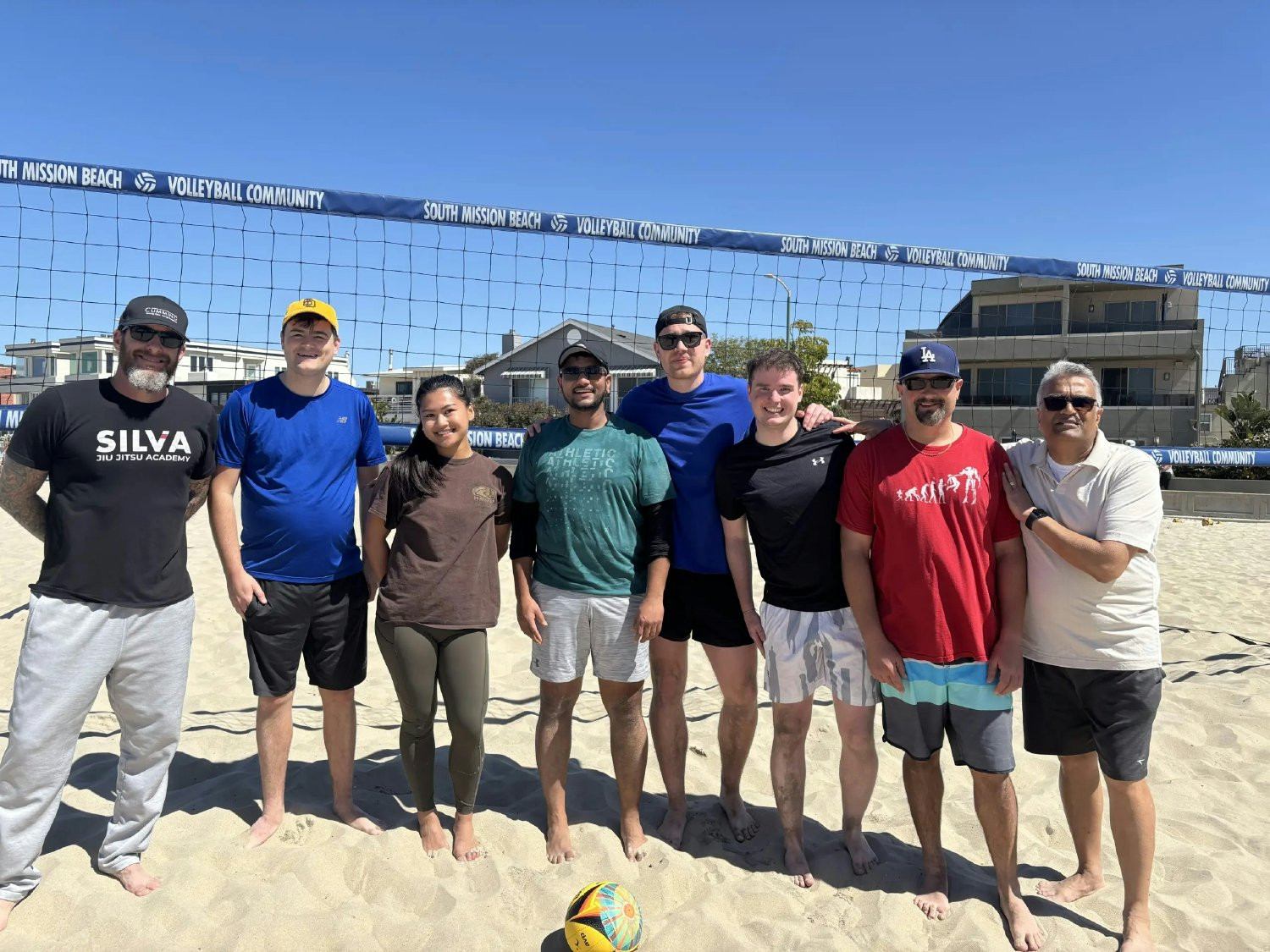 Participating in an annual volleyball tournament - staying active while giving back to our communities