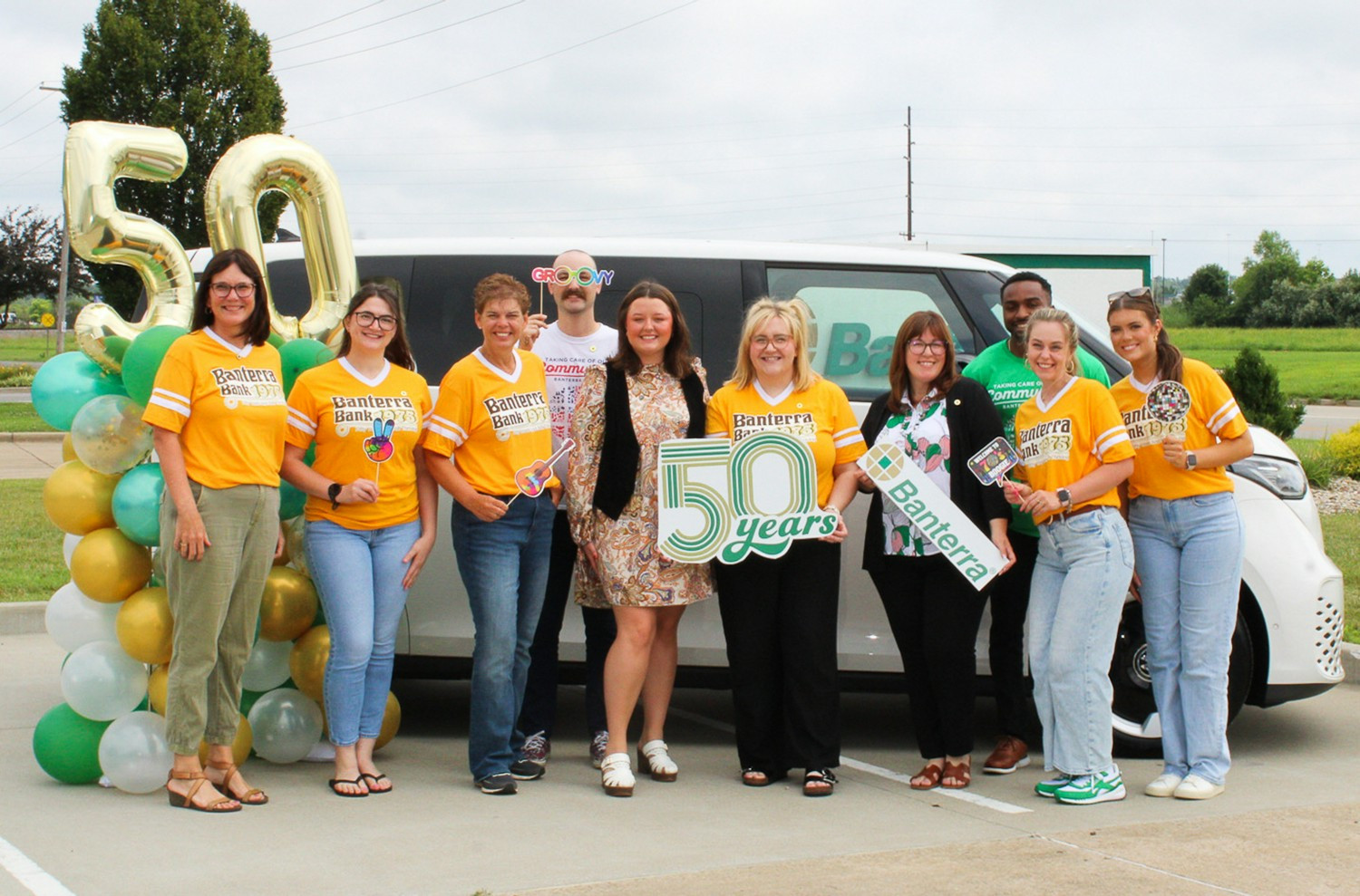 Team members in Marion, IL, celebrate Banterra’s 50th anniversary with retro apparel, dunk tanks, and community fun.