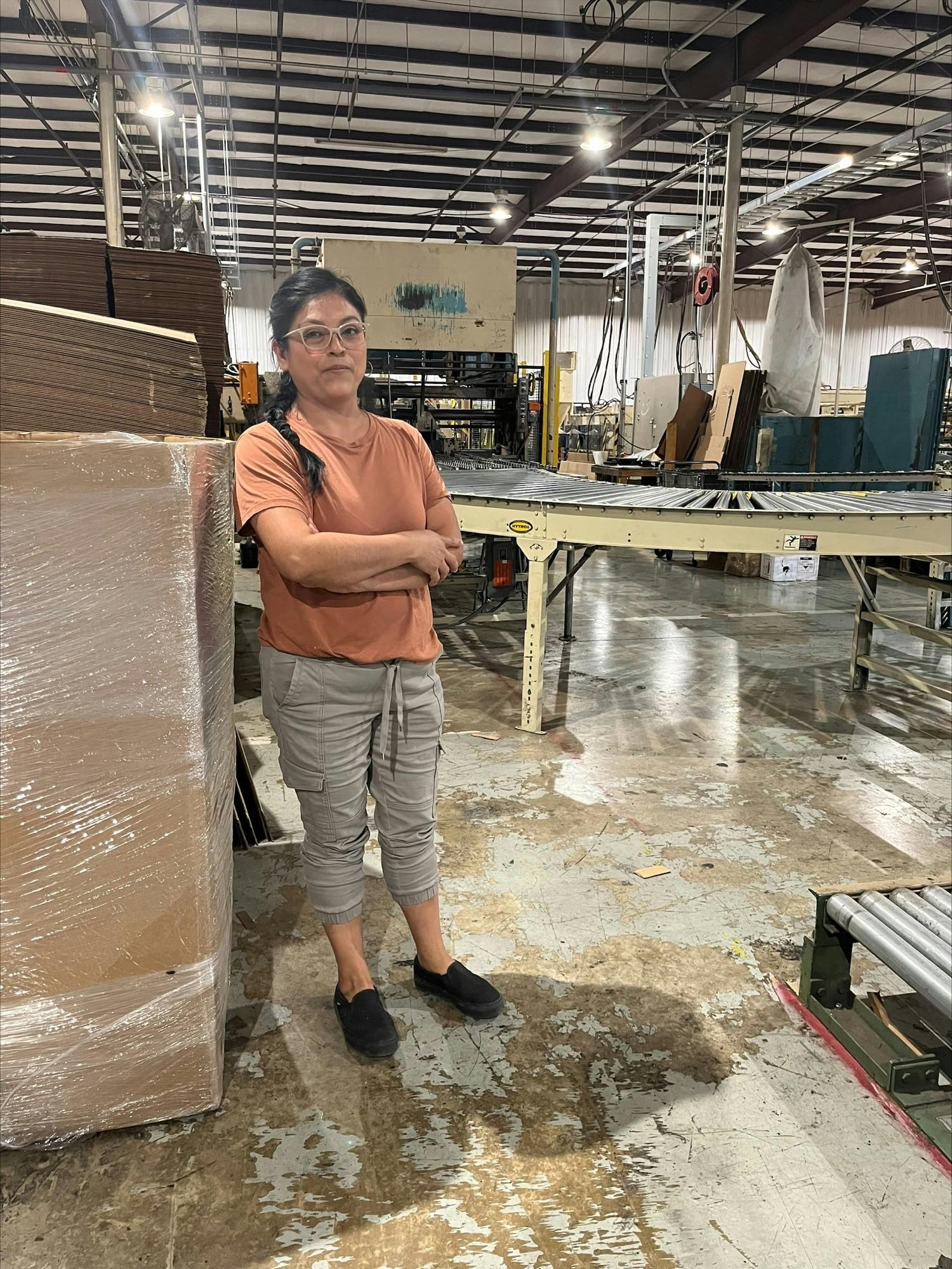 Delia posing by our machine 