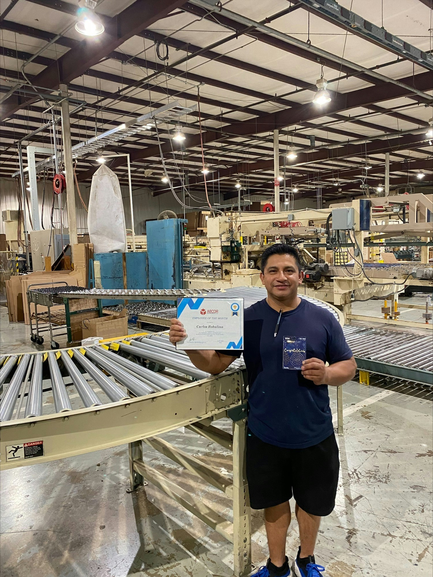 Carlos winning employee of the month 