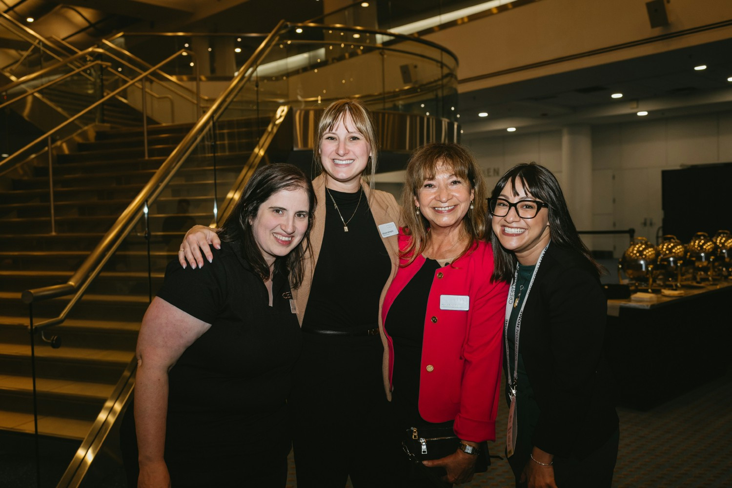 Colleagues supporting each other and making connections at the annual CEDIA Expo in Denver, CO.