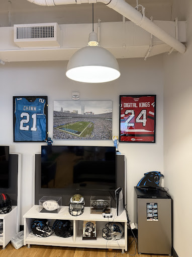 A workspace that blends passion and performance—where team pride meets motivation.
