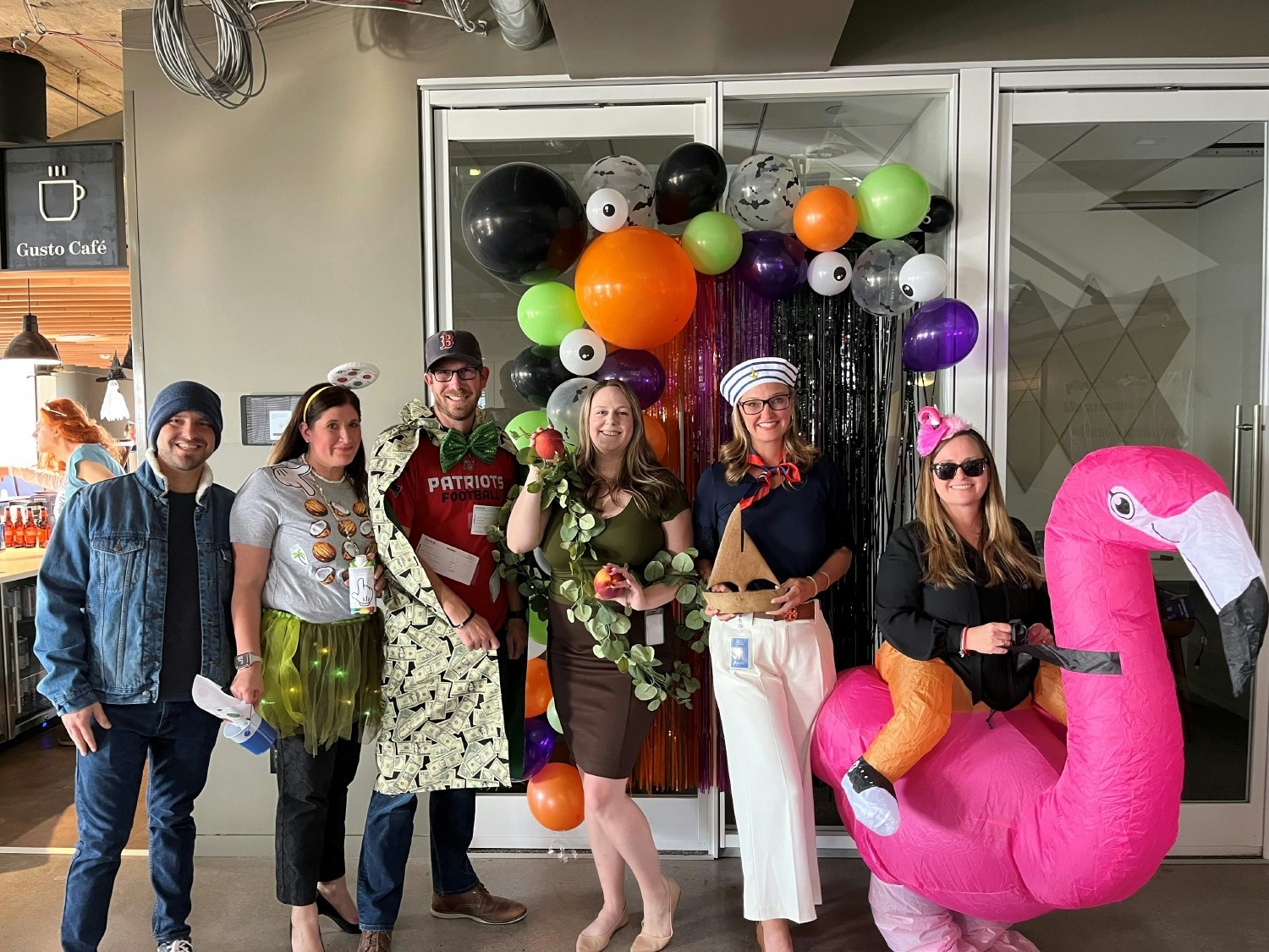 HR teammates dressed up for Halloween as different AIR communities, including Flamingo Point, Peachtree Park and others.