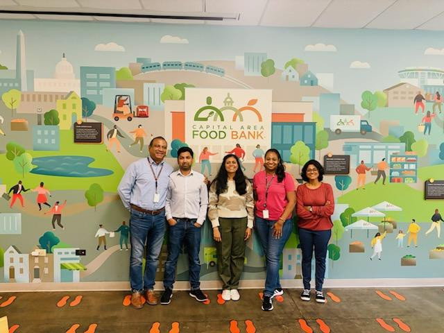 DC employees volunteered at Capital Area Food Bank, packing and sorting nonperishables for the elderly.