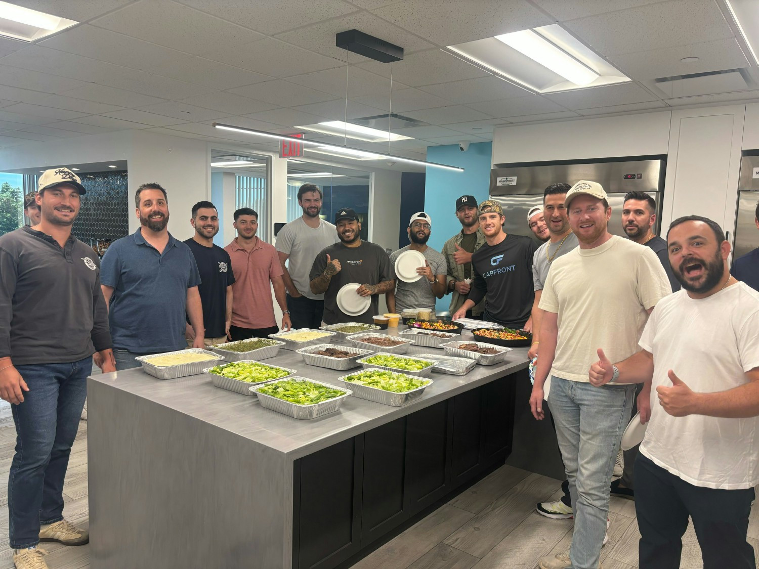 Our team enjoying a catered lunch from a local favorite, connecting and spending time together.