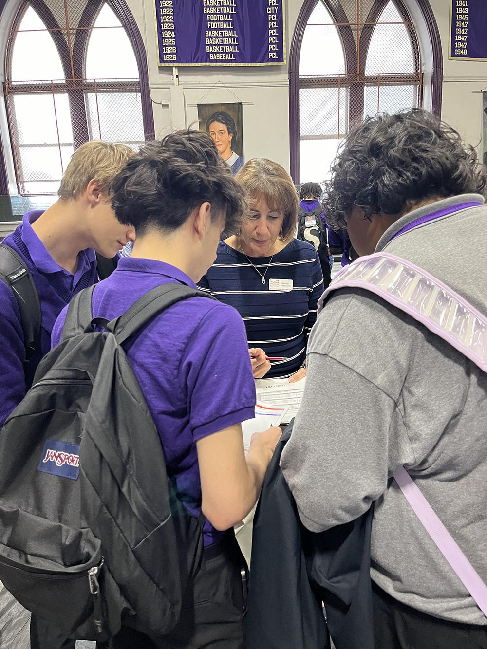 TruMark Financial's Corporate Social Responsibility team organizes annual Reality Fairs at local high schools.