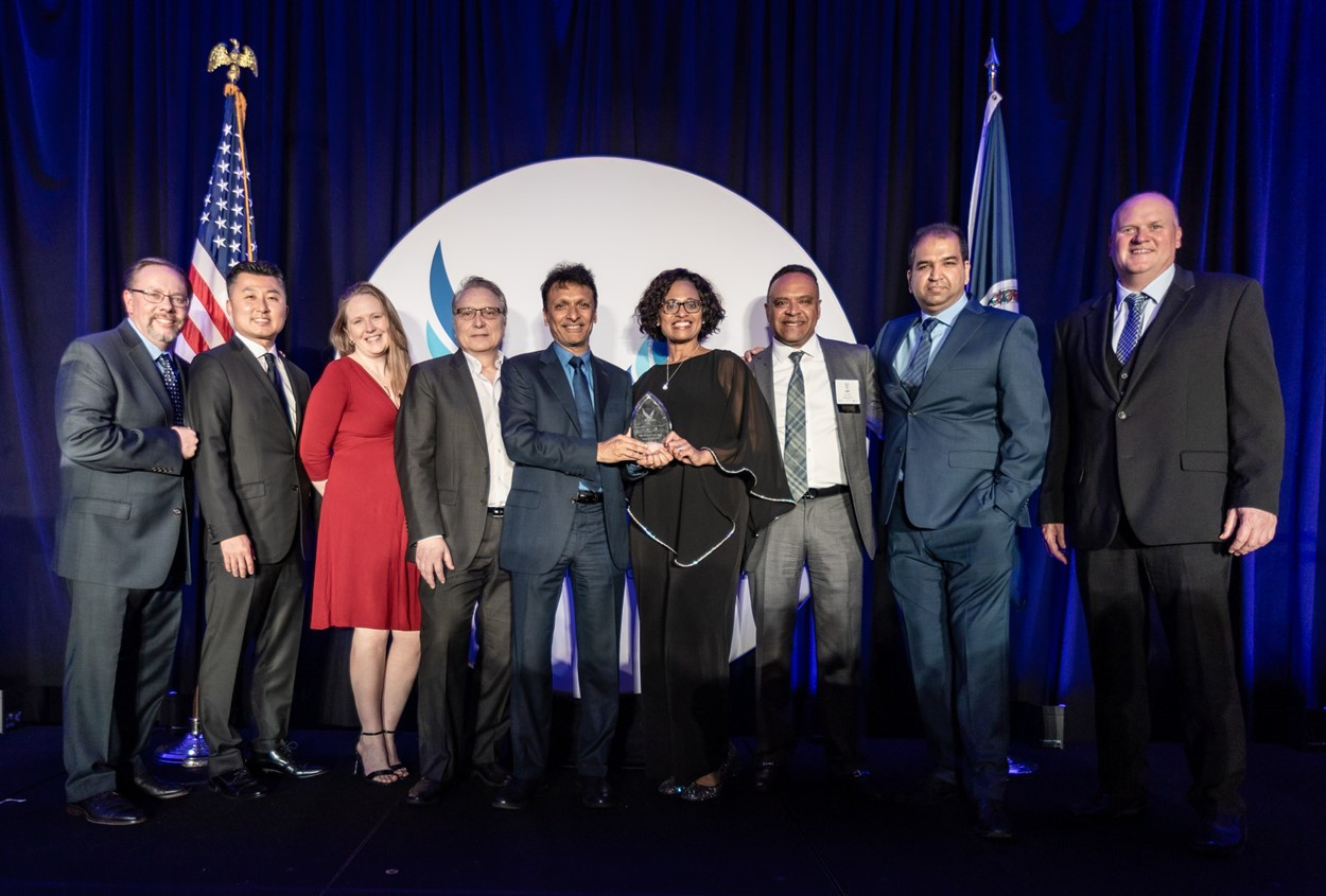 Our leadership team accepting the Program of the Year Award at the Greater Washington Government Contactor Awards