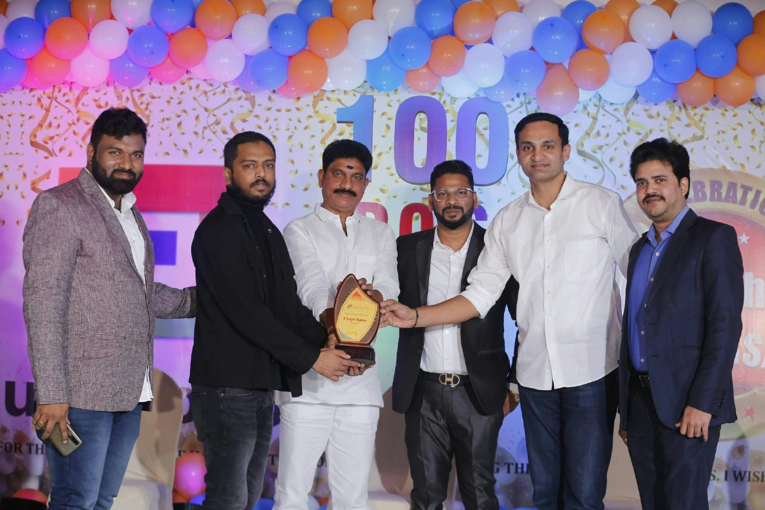 Celebrating 100 projects closures with the team