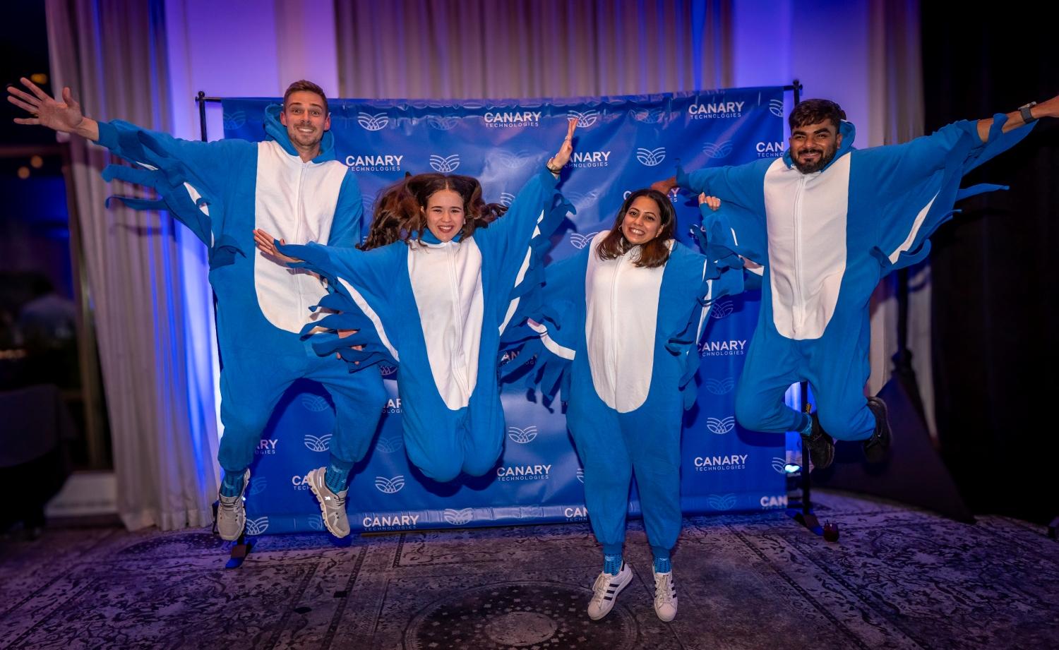Canary team members soaring in style at our unforgettable Onesie Gala in Hudson Valley, NY
