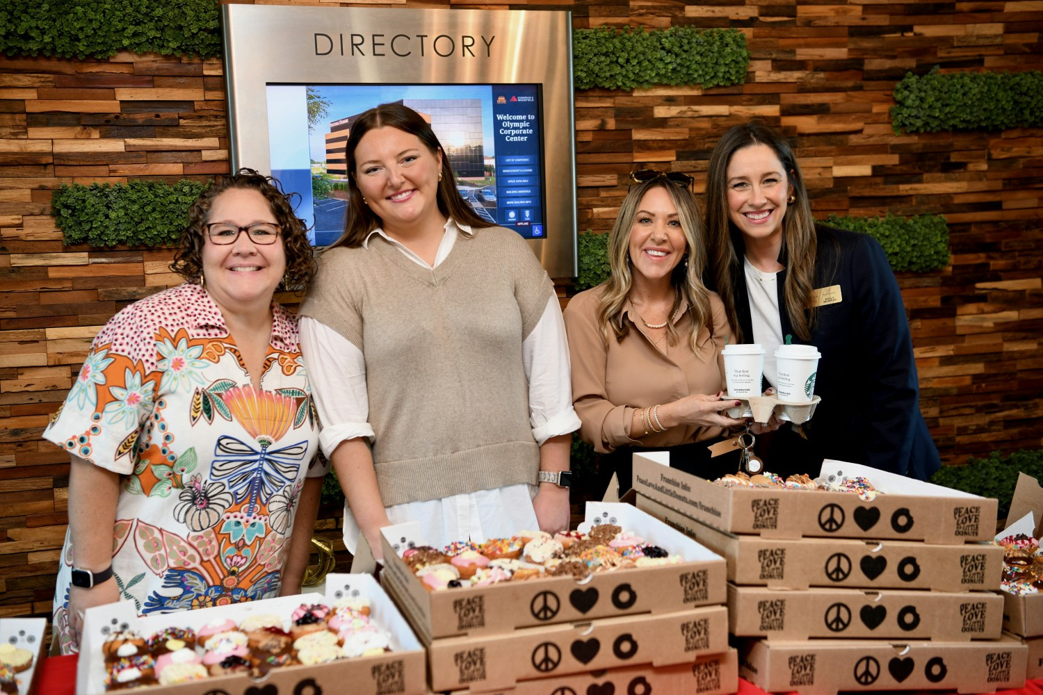 Coffee, doughnuts, and friendly faces bring Fischer Homes associates together for a sweet start to the workday.