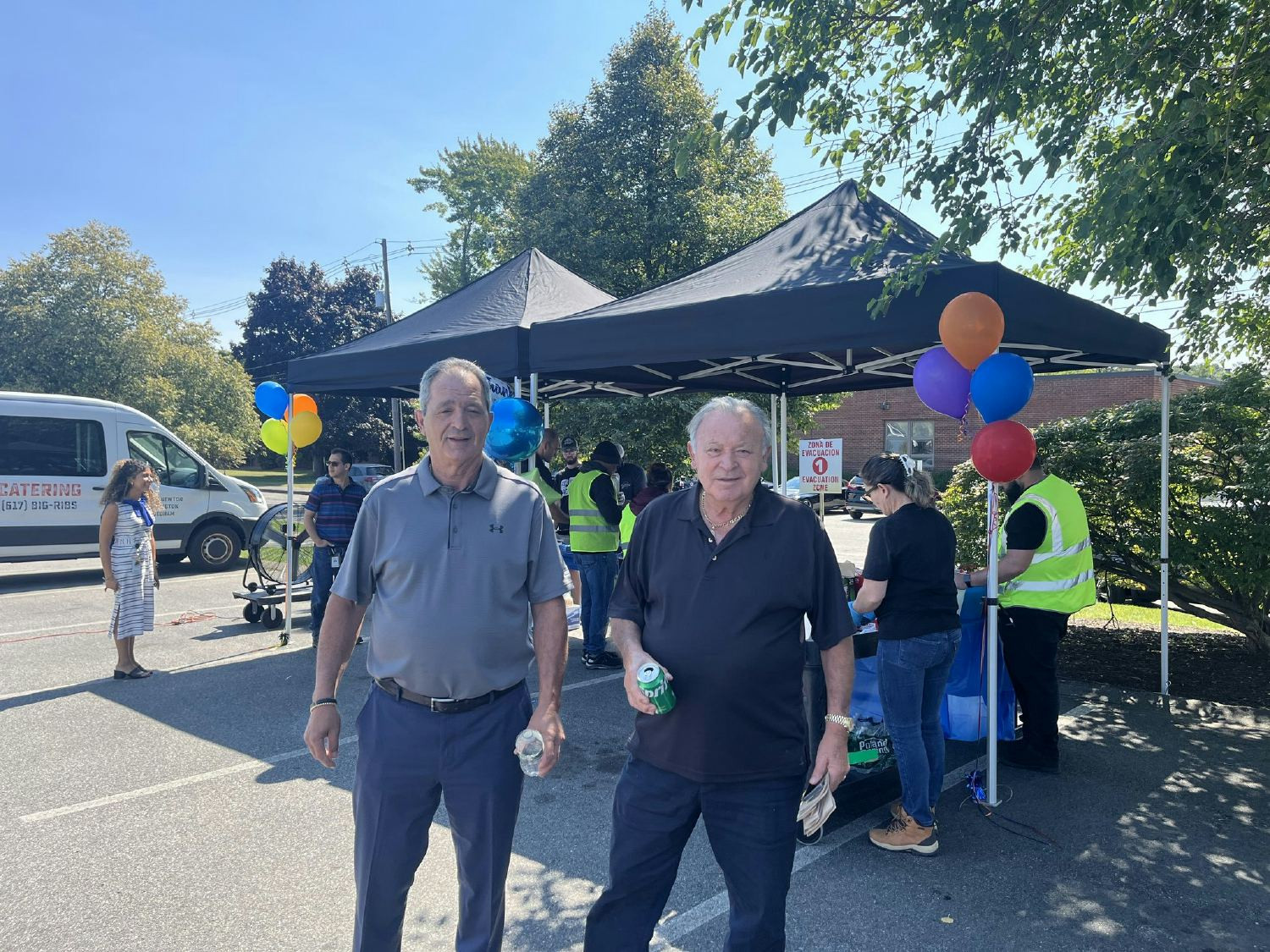 Frank Bertolino, our Founder, with his son, Leo Bertolino, our CEO, during an employee appreciation BBQ.