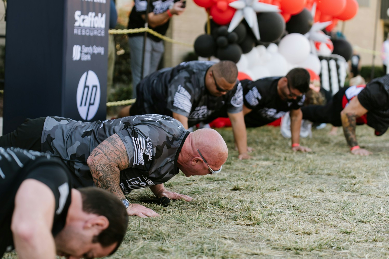 Members of our leadership team pushing the earth for our Veterans.