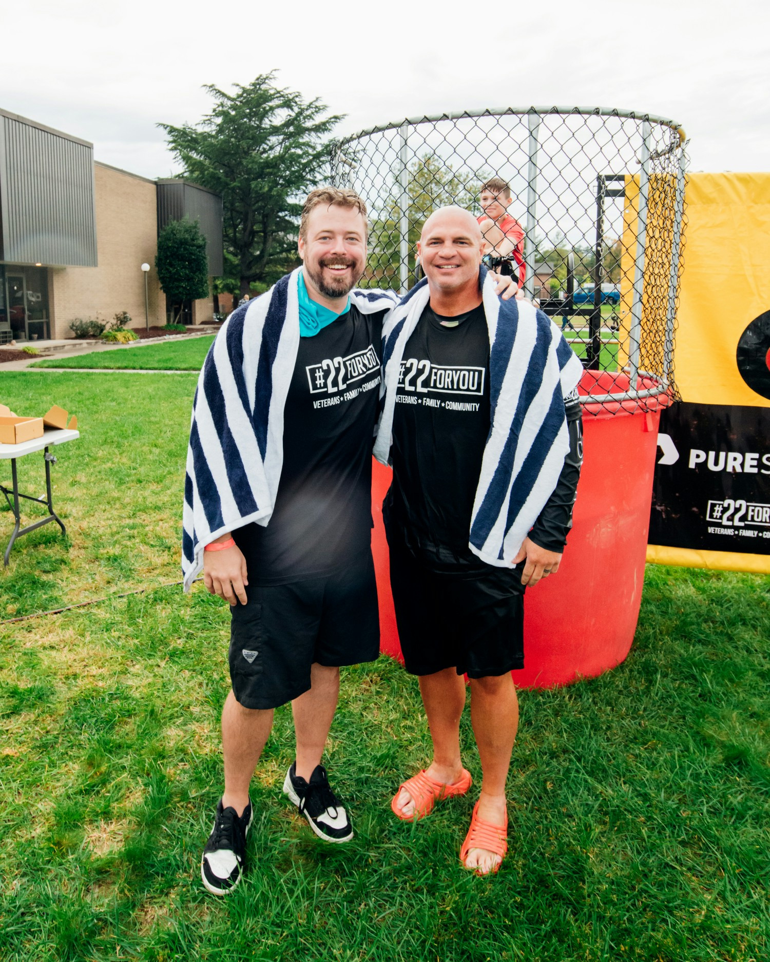 Colossa's CEO & CTO after being dunked in support of our Veterans at our #22FORYOU Event.