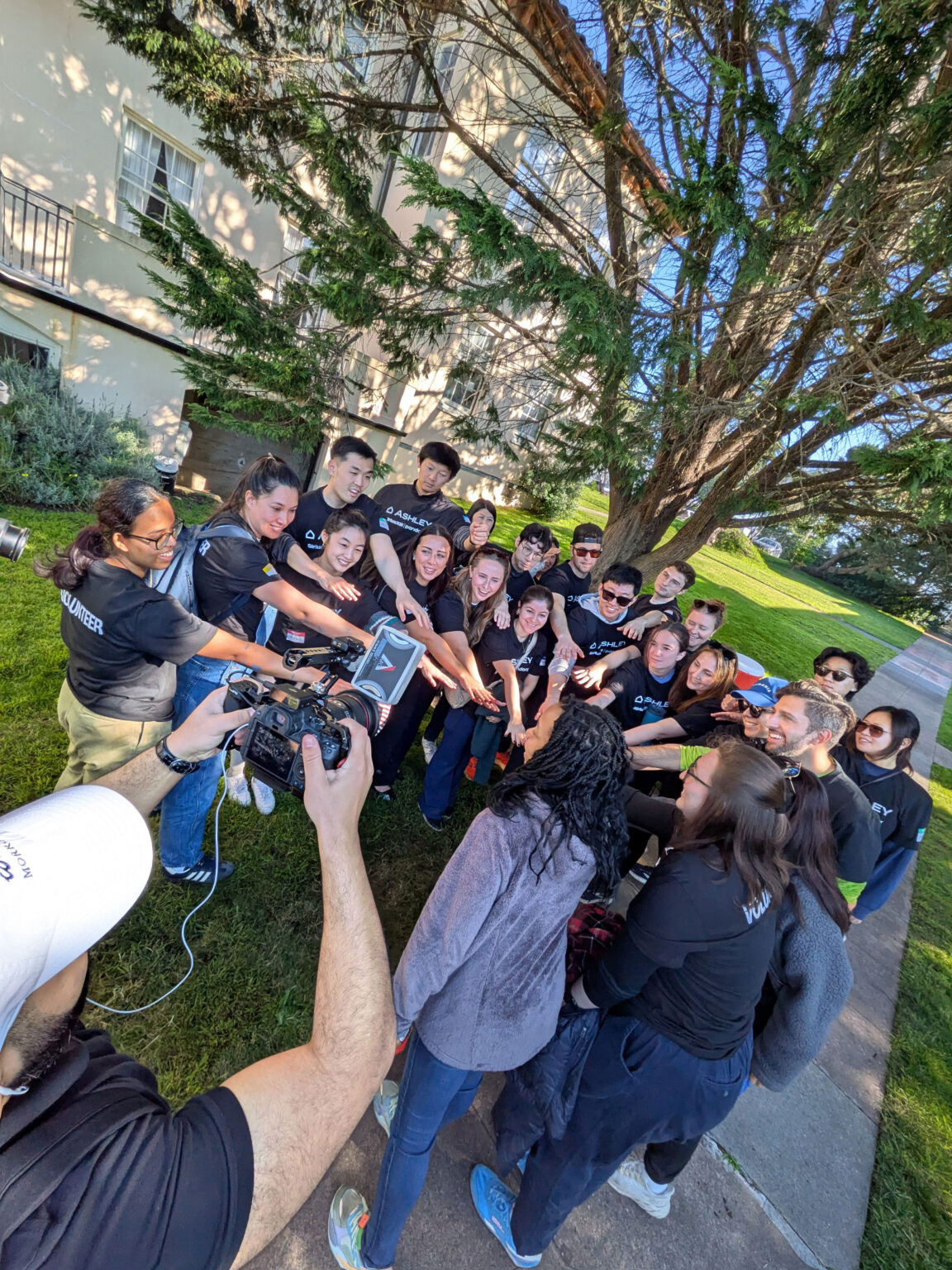 Volunteers come together after a day of service of beautifying Edgewood’s historic Vicente Street Campus.