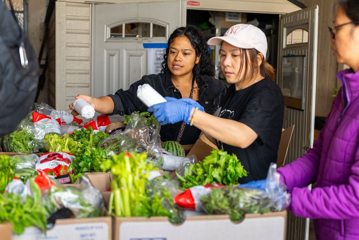 Edgewood Staff prepare bags for our bimonthly Food Bank, ensuring families receive healthy meals.